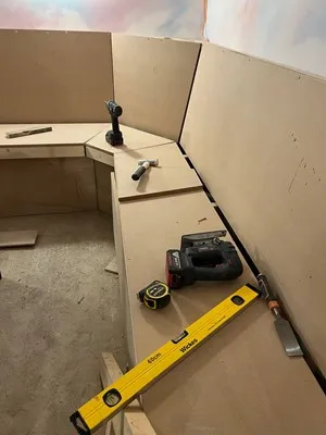 Boarded seating mid-rebuild on the workshop bench
