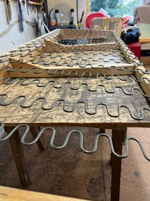 New serpentine springs fitted to a chair frame