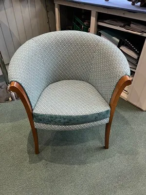 Two-tone tub chair with contrasting back panel