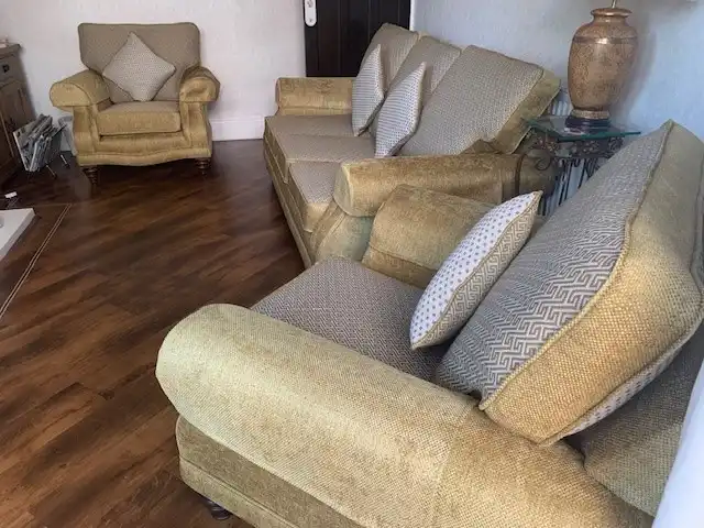 Recovered sofa and armchair in a customer's home