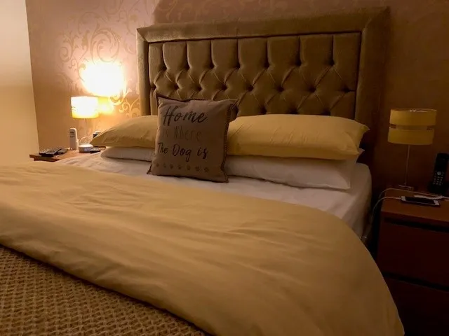 Deep-buttoned bespoke headboard