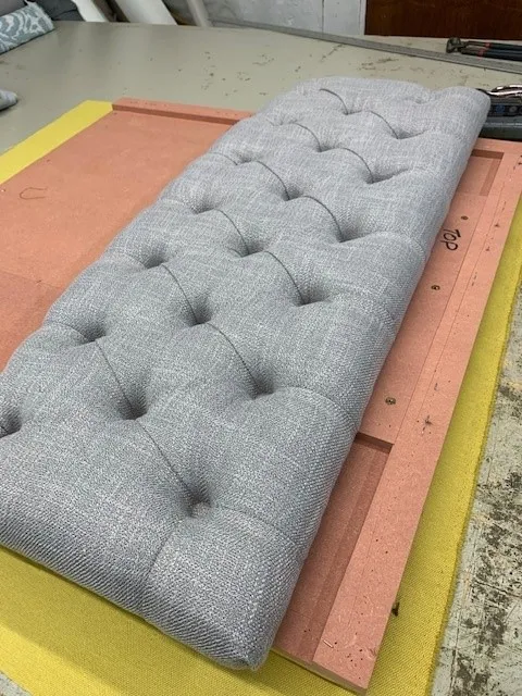 Bespoke headboard on the workbench, mid-build