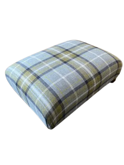 Upholstered pouffe with deep buttoning
