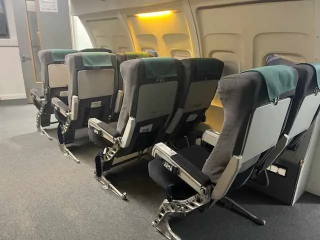 Boeing 747 seats recovered for Tameside College, in situ at the cabin crew training mock-up