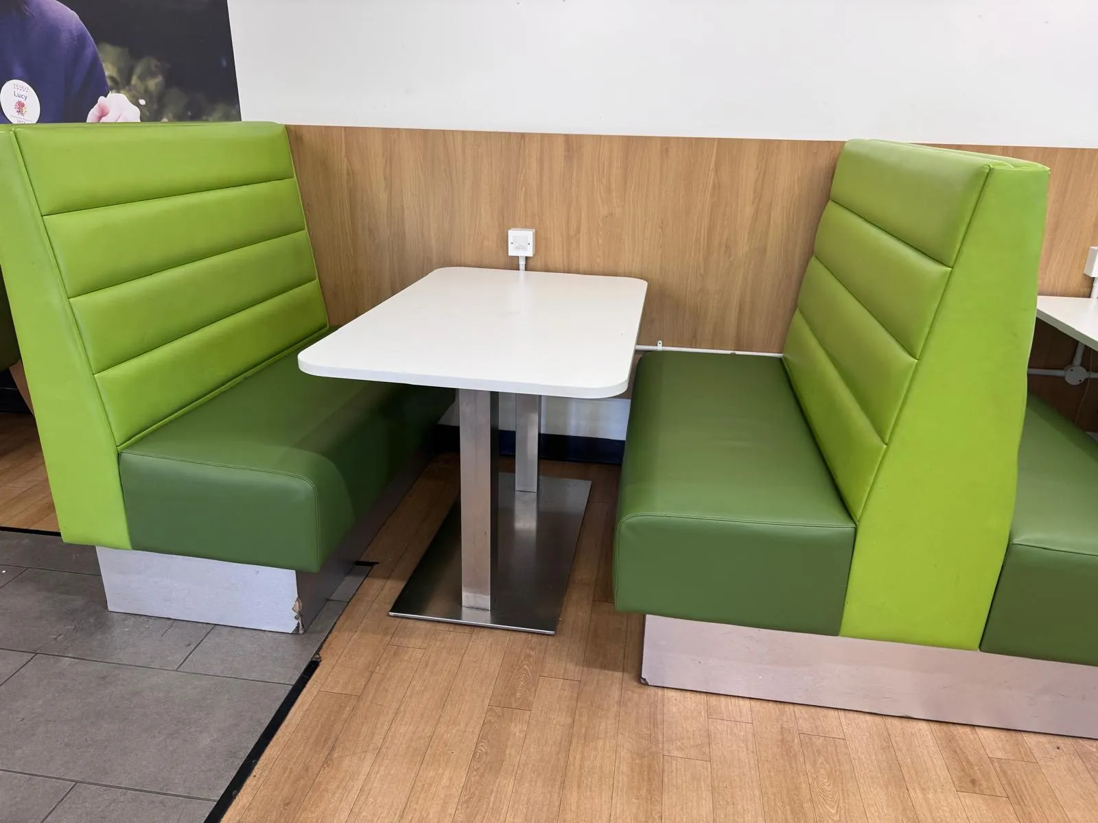 Pair of face-to-face cafe booths in lime and green wipe-clean vinyl with channelled backs