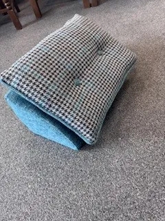 Caravan cushion freshly recovered, in situ