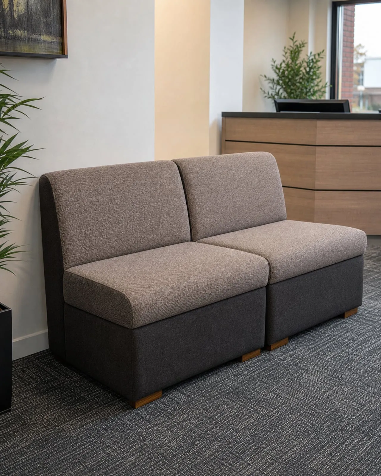 Office reception seating reupholstered in taupe and charcoal contract fabric