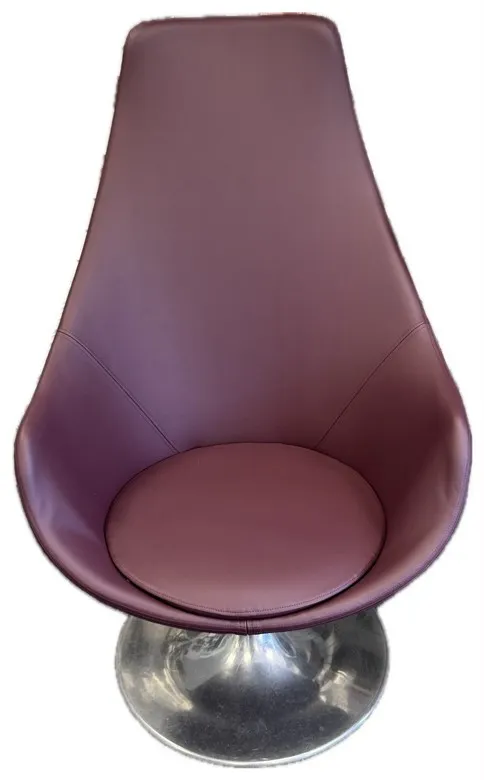 Egg-style swivel chair recovered in plum faux leather on a chrome tulip base